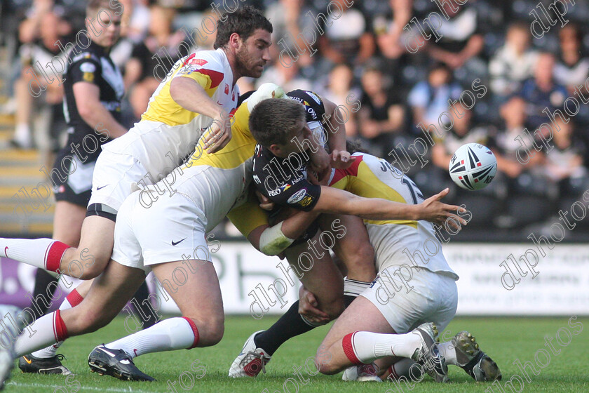 hull-fc10 
 tom briscoe offloads despite the attention of three catalan defenders 
 Keywords: tom briscoe