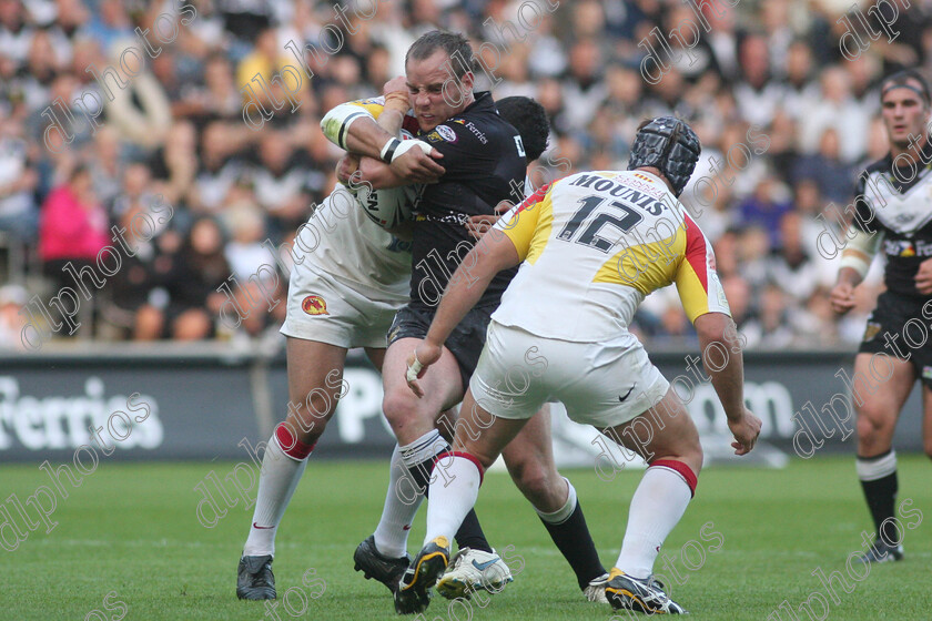 hullfc08 
 ewan dowes shows determination in trying to break the tackle as mounis closes in to assist 
 Keywords: ewan dowes