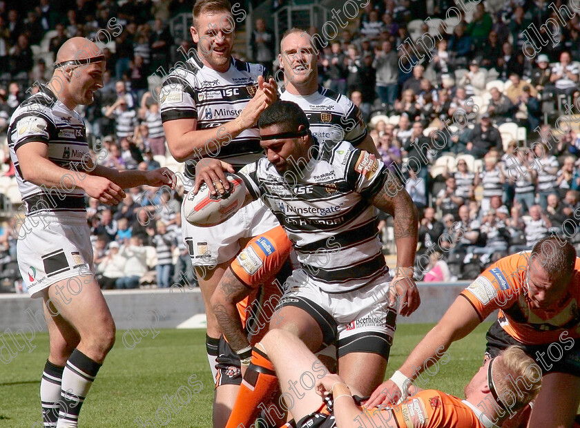 hull-castleford286 
 Danny Houghton and Liam Watts with Mickey Paea after he has forced his way over from short distance to score 
 Keywords: Hull FC, Castleford Tigers