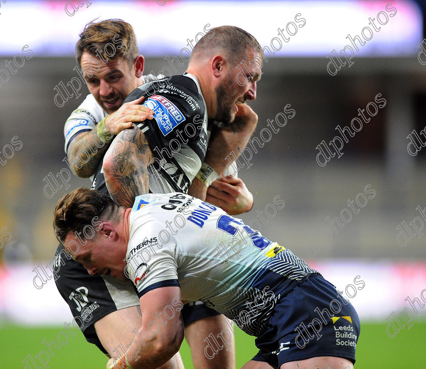 GriffinJosh1-8-1020jr 
 Hull FC's Josh Griffin is stopped by Leeds Rhinos's Richie Myler and James Donaldson

Betfred Super League XXV Hull FC v Leeds Rhinos 08/10/20 (Pic by John Rushworth) 
 Keywords: Rugby, Rugby League, Sport, Betfred, Leeds, Rhinos, Hull, FC, Emerald, Stadium, Headingley