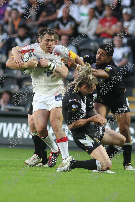 hullfc03 
 sean long goes down in agony holding his wrist as willie manu and kirk yeaman complete the tackle