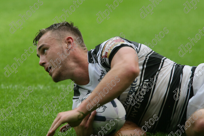 fc-wakefield1390 
 Jack Logan dives in to score 
 Keywords: Hull FC, Wakefield Wildcats