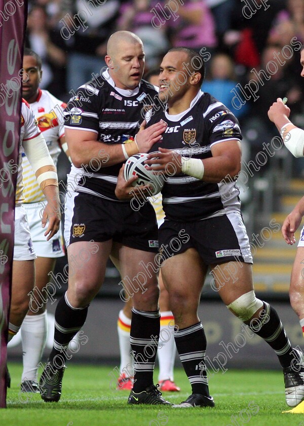 fc-catalan0148A 
 mark omeley congratulates sam moa on scoring the first try