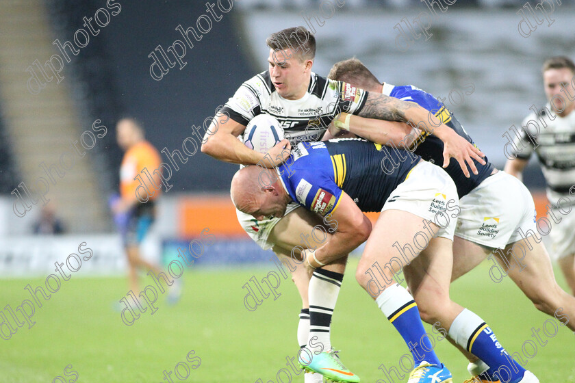 hullfc-leeds0099 
 dlphotos.co.uk
Hull FC v Leeds Rhinos; 21/08/2015 KO 8 pm 
KC Stadium
copyright picture;Dave Lofthouse 07886650735
Jamie Shaul well tackled by Carl Ablett 
 Keywords: Hull FC, Leeds Rhinos, Super 8s, Dlphotos, Dave Lofthouse