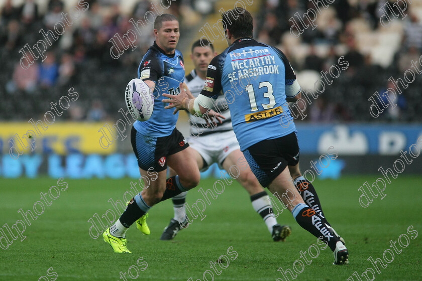 hull-st-helens265 
 Travis Burns offloads to Louie McCarthy-Scarsbrook 
 Keywords: Hull FC, St Helens